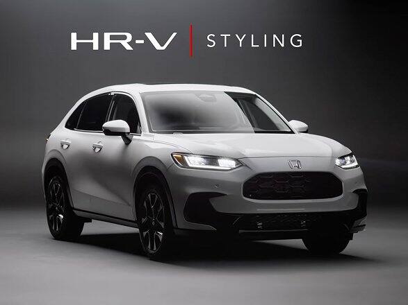 2027 Honda HR-V EX-L in Platinum White Pearl three quarter view in with Interior text (Subcompact Crossover SUV).